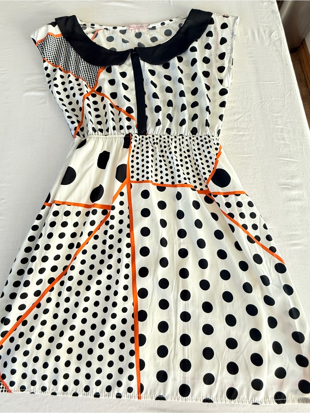 Polka Dot Mini Dress with Black Collar and Orange Trim